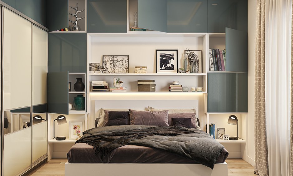 Shelving and storage solutions displayed in a room, with open shelves and cabinets holding neatly organized items.